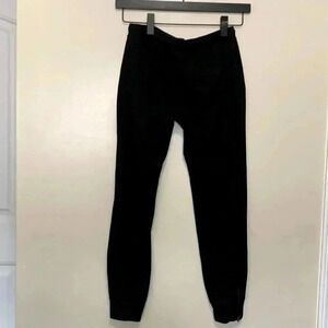 Banana Republic black  sweatpants with zippers at the ankle and a front tie.